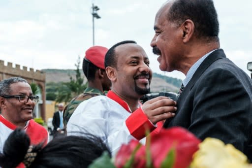 Ethiopian Prime Minister Abiy Ahmed (C) and Eritrea's President Isaias Afwerki embarked on a whip-fast rapprochement last year