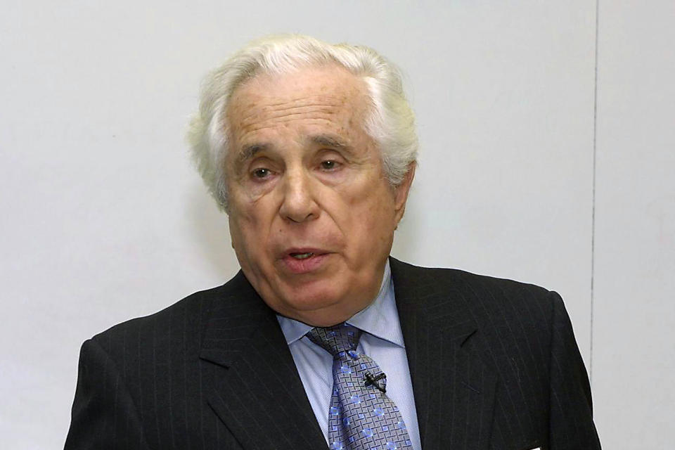 FILE - Seymour Topping, Pulitzer board administrator, speaks at the Graduate School of Journalism of Columbia University in New York, in this March 4, 2002, file photo. Topping, among the most accomplished foreign correspondents of his generation for The Associated Press and the New York Times and later a top editor at the Times and administrator of the Pulitzer Prizes, died on Sunday, Nov. 8, 2020, in White Plains, N.Y. He was 99. Topping passed away “peacefully” at White Plains Hospital, his daughter Rebecca said in an emailed statement. (AP Photo/David Karp, File)