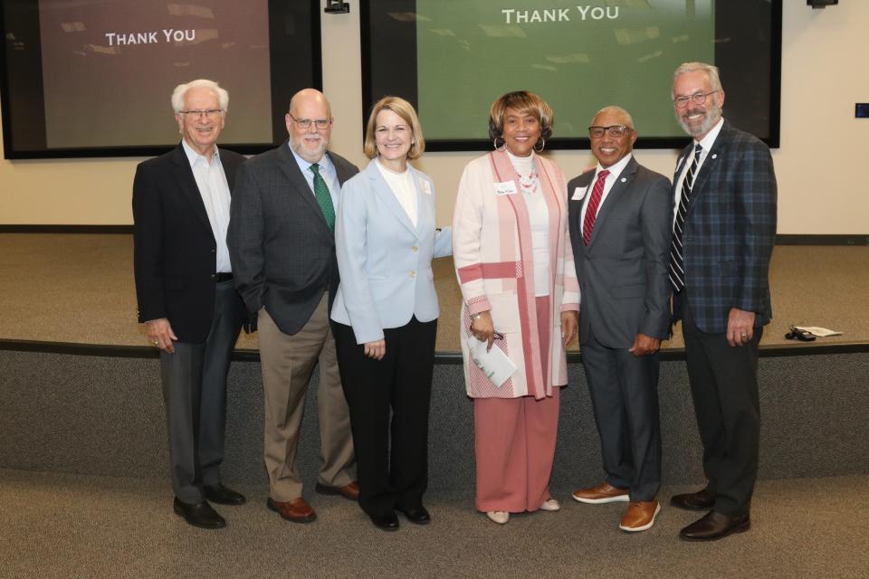 Gathering for a photo at Chad Berry's Feb. 8 talk on Appalachia and its people are Jim Palmer, from left, Oak Ridge Institute for Continued Learning; Tim Munro and Berea College President Cheryl L. Nixon (Munro is her husband); Ruby Miller and Charles D. Crowe, Oak Ridge Breakfast Rotary Club; and Berry.