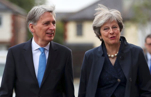 PM Theresa May and Chancellor Philip Hammond. (Hannah McKay/PA)