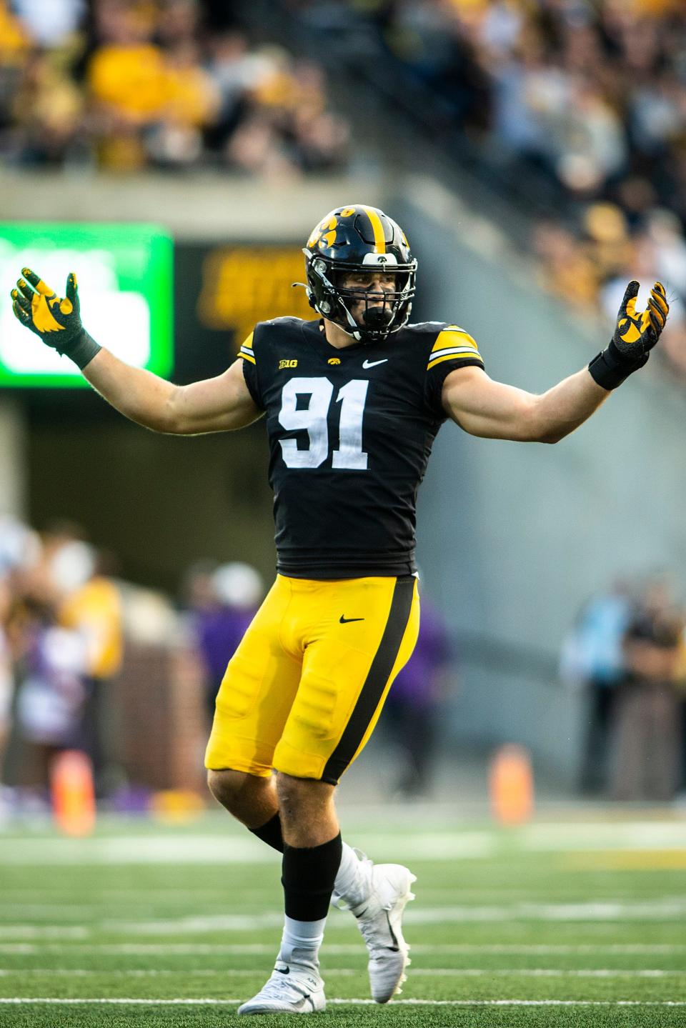 Iowa defensive lineman Lukas Van Ness (91) reacts during a game against Northwestern, Saturday, Oct. 29, 2022, at Kinnick Stadium in Iowa City, Iowa.