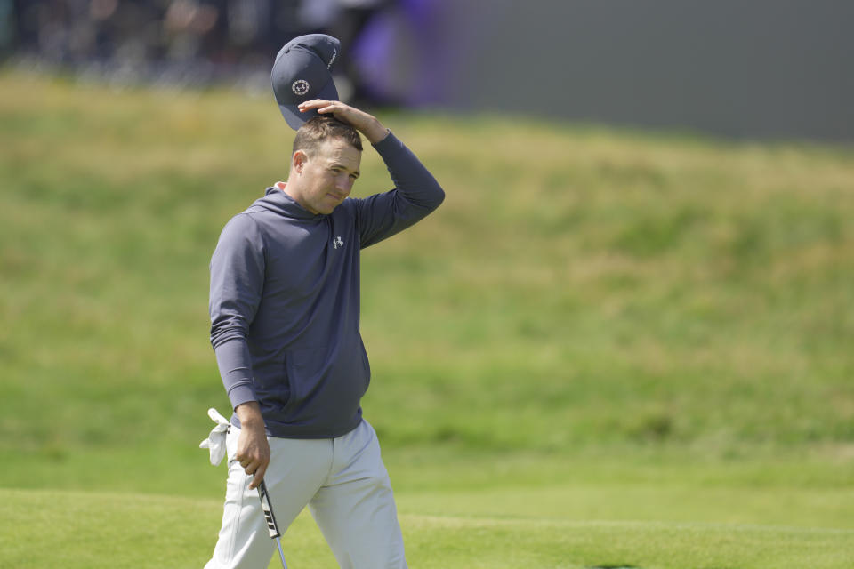 United States' Jordan Spieth reacts after putting and completing his 1st round on the 18th green on the first day of the British Open Golf Championships at the Royal Liverpool Golf Club in Hoylake, England, Thursday, July 20, 2023. (AP Photo/Kin Cheung)