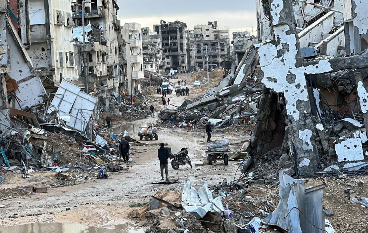 A view of Khan Yunis in Gaza on Feb. 2, 2024, after weeks of continuous Israeli bombardment and bulldozing. <a href="https://www.gettyimages.com/detail/news-photo/view-of-destruction-with-destroyed-buildings-and-roads-news-photo/1973198679?adppopup=true" rel="nofollow noopener" target="_blank" data-ylk="slk:Abdulqader Sabbah/Anadolu via Getty Images;elm:context_link;itc:0;sec:content-canvas" class="link ">Abdulqader Sabbah/Anadolu via Getty Images</a>