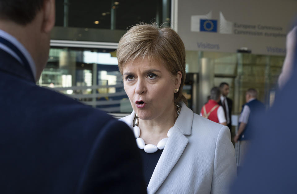 Scotland's First Minister Nicola Sturgeon speaks with journalists outside EU headquarters in Brussels, Tuesday, June 11, 2019. Scottish First Minister Nicola Sturgeon is in Brussels Tuesday to meet with European Union chief Brexit negotiator Michel Barnier and European Commission President Jean-Claude Juncker. (AP Photo/Virginia Mayo)