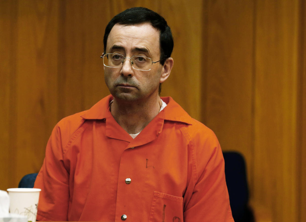 Former Michigan State University and USA Gymnastics doctor Larry Nassar listens during the sentencing phase in Eaton, County Circuit Court on Jan. 31, 2018 in Charlotte, Mich. (Jeff Kowalsky / AFP via Getty Images file)