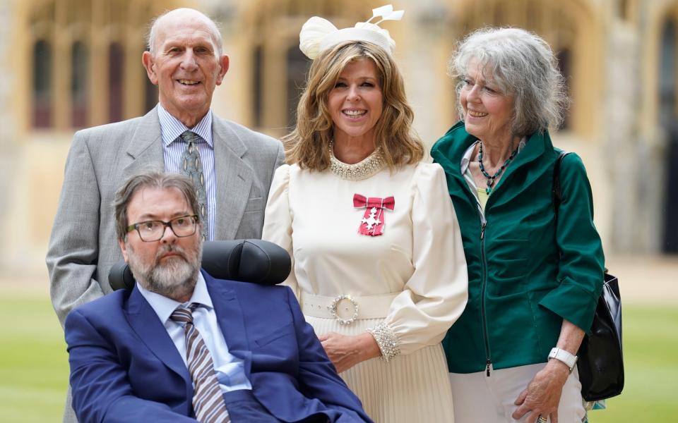 Kate Garraway, with her parents and husband, Derek Draper, was awarded an MBE for her services to broadcasting, journalism and charity in June 2023