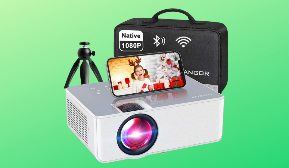 A white mini projector, a small black tripod, a black carrying case for the projector, and a smartphone with image on screen of a girl on Christmas wearing an antler headband