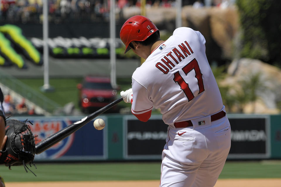 Los Angeles Angels' Shohei Ohtani hits into a fielder's choice during the seventh inning of a baseball game against the Minnesota Twins Sunday, May 21, 2023, in Anaheim, Calif. Mickey Moniak was thrown out at first on the play and Ohtani was safe at first. (AP Photo/Mark J. Terrill)