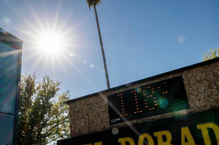 A temperature sign outside a bank in Sacramento, Calif., reads 118&#xb0;.