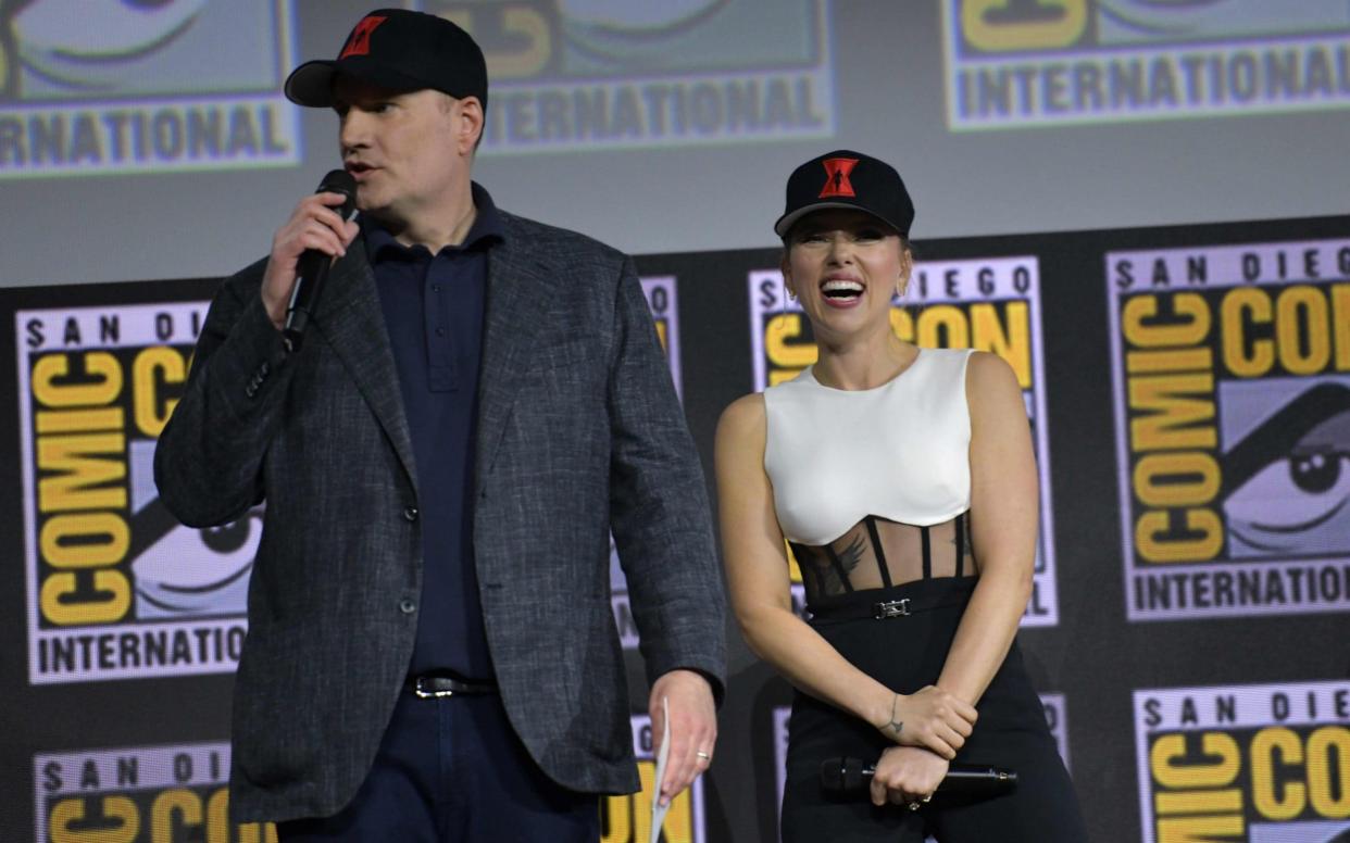 President of Marvel Studios Kevin Feige (L) and US actress Scarlett Johansson speak on stage for the Marvel panel in Hall H of the Convention Center during Comic Con in San Diego - AFP