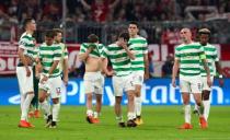 Soccer Football - Champions League - Bayern Munich vs Celtic - Allianz Arena, Munich, Germany - October 18, 2017 Celtic’s Scott Brown, Kieran Tierney, James Forrest, Scott Sinclair and team mates look dejected at the end of the match REUTERS/Michael Dalder