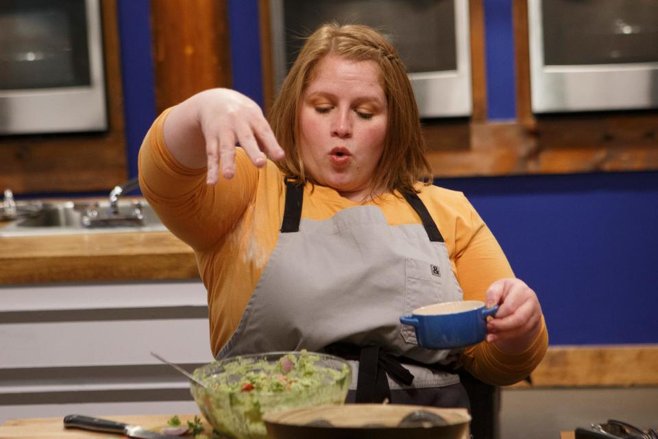 Tiffany Billingsly of Greenwood cooks during the baseline challenge on Worst Cooks in America, Season 21.