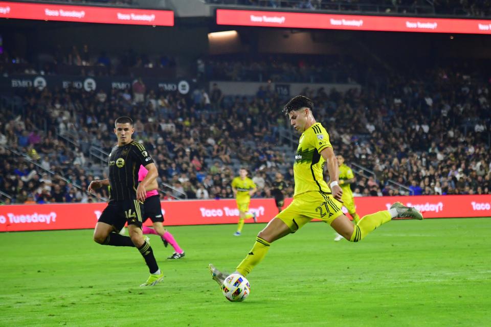 Jul 13, 2024; Los Angeles, California, USA; Columbus Crew forward Max Arftsen (27) controls the ball against LAFC in the second half at BMO Stadium. Mandatory Credit: Gary A. Vasquez-USA TODAY Sports