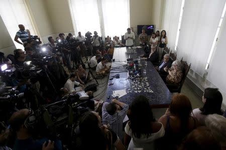 The researcher Myrna Bonaldo (R), the President of Oswaldo Cruz Foundation Paulo Gadelha (2nd R) and Wilson Savino (3rd R), Director of the Oswaldo Cruz Institute attend a news conference in Rio de Janeiro, Brazil, February 5, 2016. REUTERS/Ricardo Moraes