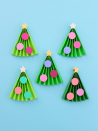 <p>All kids need is five minutes to make this super-simple Christmas tree craft. Fold green craft paper accordion style, and then deck it with colorful paper cutouts as ornaments — and don’t forget the star on top.</p><p><em><a href="https://www.whitehousecrafts.net/post/2019/11/24/5-minute-kids-accordion-christmas-tree-craft" rel="nofollow noopener" target="_blank" data-ylk="slk:Get the tutorial at White House Crafts »;elm:context_link;itc:0;sec:content-canvas" class="link ">Get the tutorial at White House Crafts »</a></em></p>