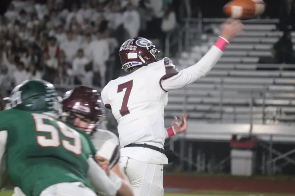 Genoa's Aiden Brunkhorst throws a pass.