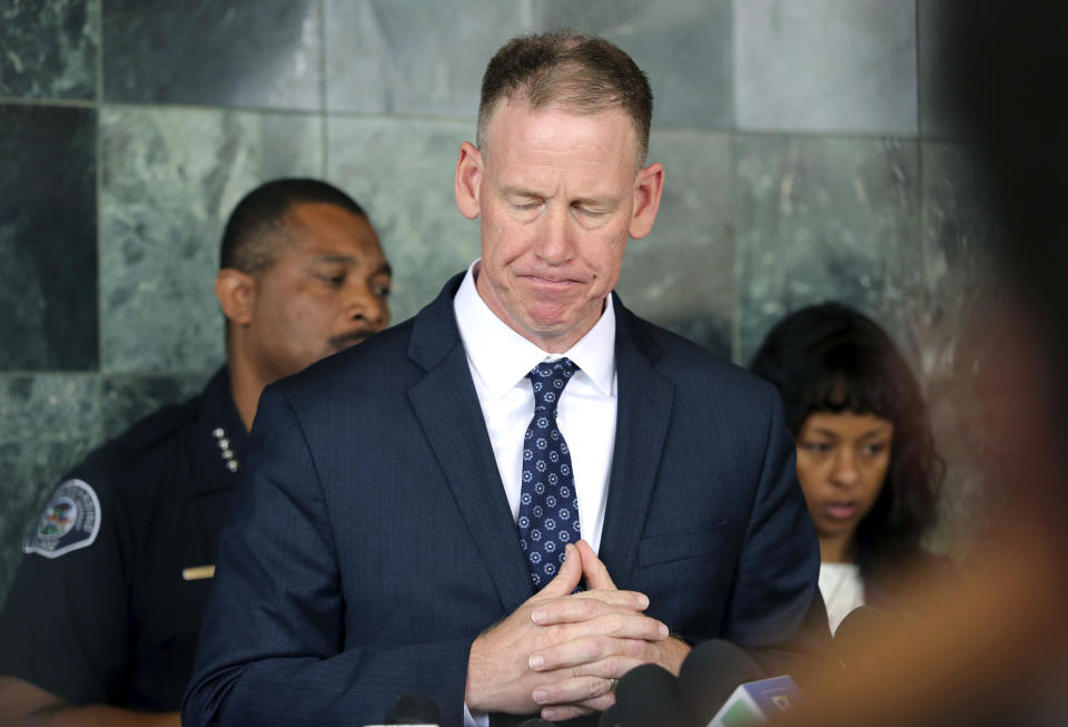 San Bernardino city schools superintendent Dale Marsden briefs reporters at police headquarters in San Bernardino, Calif., Tuesday, April 11, 2017. The man who fatally shot his estranged wife and a student in her San Bernardino elementary school classroom before killing himself had threatened her when she moved out of their house, authorities said Tuesday. (AP Photo/Reed Saxon)