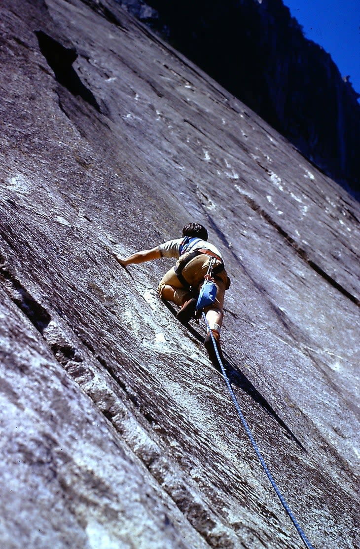 <span class="article__caption">The author, runout, during the first ascent of Hoser’s Highway on Glacier Point Apron, Yosemite. The team settled on a book of rules for the first ascent that only allowed one bolt per pitch. Numerous bolts were later added by repeat teams, who also renamed the route.</span> (Photo: Eric Sanford Collection)