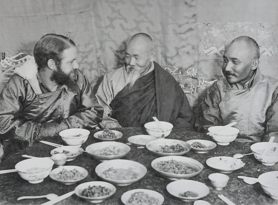 Ernst Schäfer, left and the Tibetan official Möndro, far right, as guests of the Abbot of Tashi Lhunpo in Tibet 