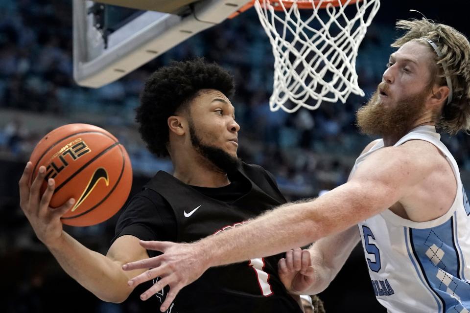 North Carolina forward Brady Manek, right, applies defensive pressure against Brown guard Dan Friday last month in Chapel Hill.