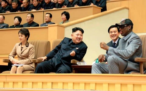 North Korean leader Kim Jong Un watches a basketball game between former U.S. NBA basketball players and North Korean players  - Credit: Reuters