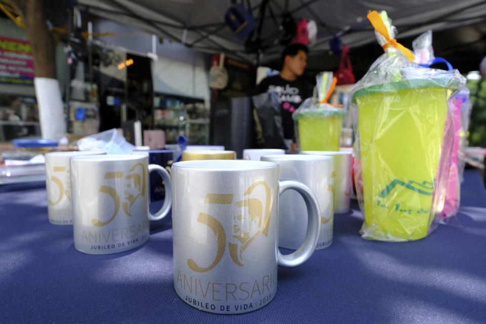 Commemorative cups featuring the La Luz del Mundo, Spanish for The Light of the World, church leader Naason Joaquin Garcia, are displayed for sale at the church’s home base that includes cafeterias, clinics, and a recreation center, in the Hermosa Provincia neighborhood of Guadalajara, Mexico, Saturday, Aug. 13, 2022. La Luz del Mundo is sometimes described as evangelical, but its members do not embrace this term. (AP Photo/Refugio Ruiz)