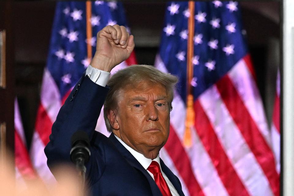Former US President Donald Trump gestures after delivering remarks at Trump National Golf Club Bedminster in Bedminster, New Jersey, on June 13, 2023. Trump appeared in court in Miami for an arraignment regarding 37 federal charges, including violations of the Espionage Act, making false statements, and conspiracy regarding his mishandling of classified material after leaving office.
