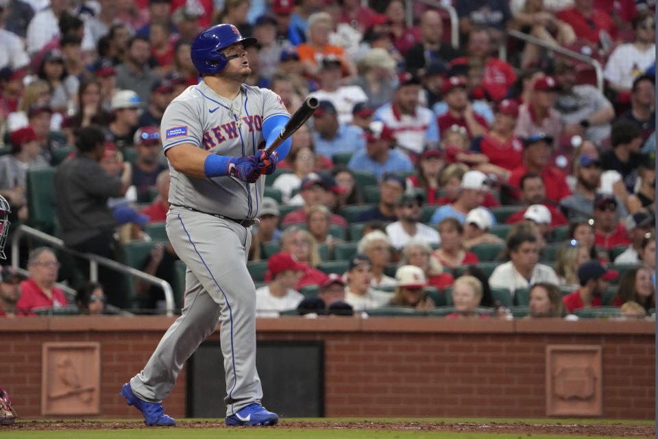 New York Mets' Daniel Vogelbach watches his grand slam during the fifth inning of a baseball game against the St. Louis Cardinals Saturday, Aug. 19, 2023, in St. Louis. (AP Photo/Jeff Roberson)