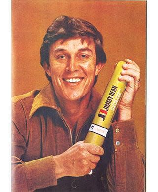 Jimmy Dean is pictured with a sample of the pork sausage made at the Jimmy Dean Meat Company.