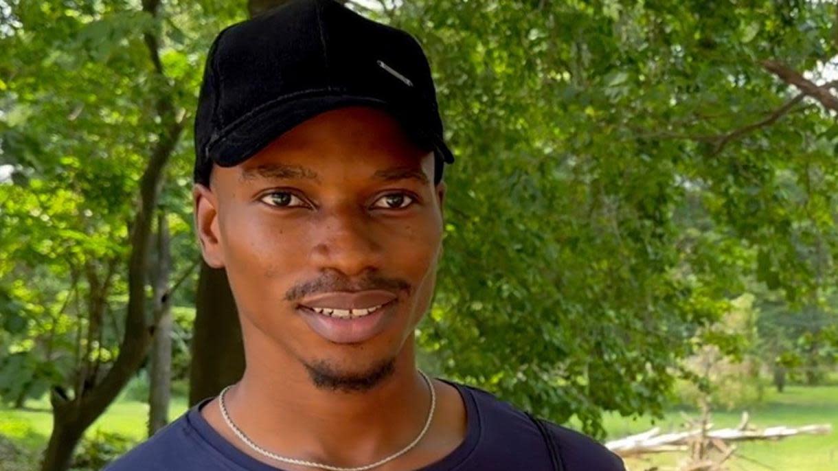 Young man in a baseball cap