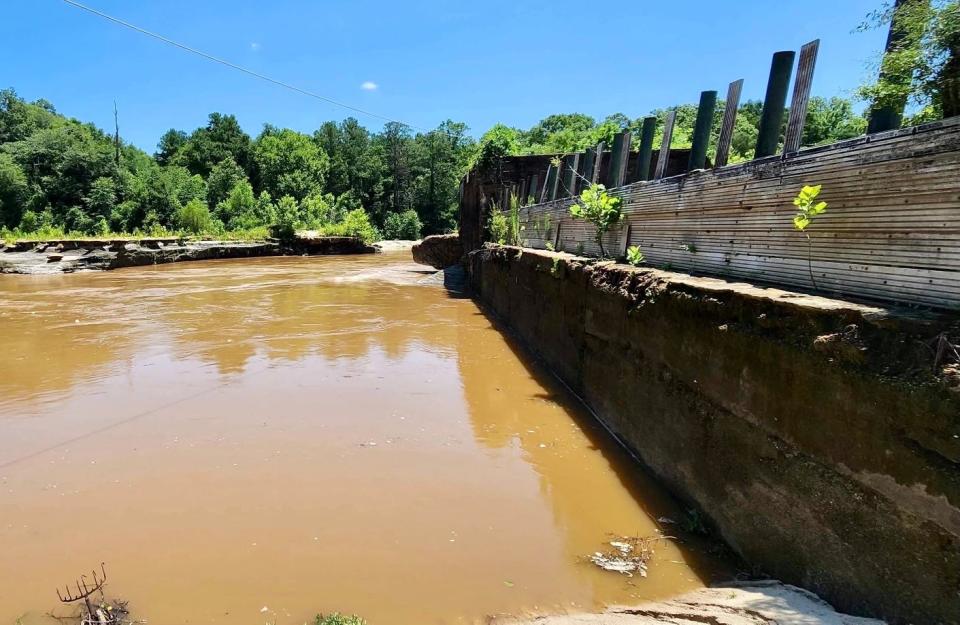 A section of the historic hydroelectric dam on the Pea River, in Elba, Alabama, is shown on June 26, 2023.