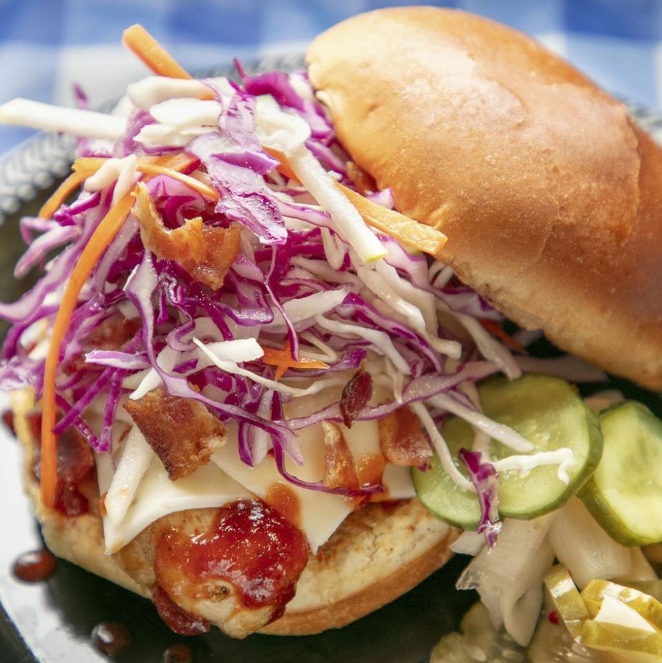 grilled chicken sandwich with slaw and pickles