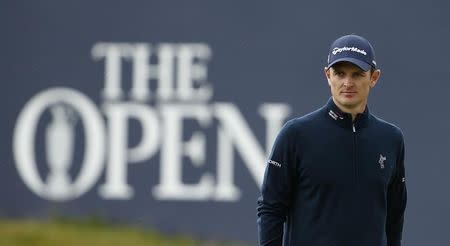 Justin Rose of England walks to the second tee during the final round of the British Open golf championship on the Old Course in St. Andrews, Scotland, July 20, 2015. REUTERS/Phil Noble