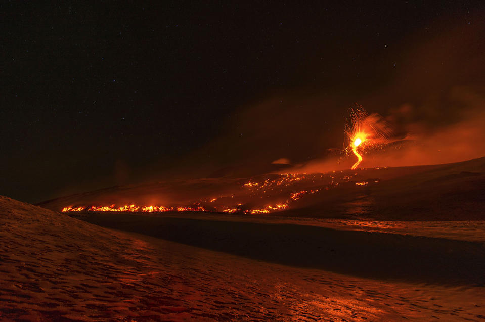 <p>Mount Etna, Europe’s most active volcano, spews lava during an eruption, near the Sicilian town of Catania, southern Italy, Tuesday, Feb. 28, 2017. The eruption was not dangerous and the airport of Catania is still open and fully operating. (Salvatore Allegra/AP) </p>