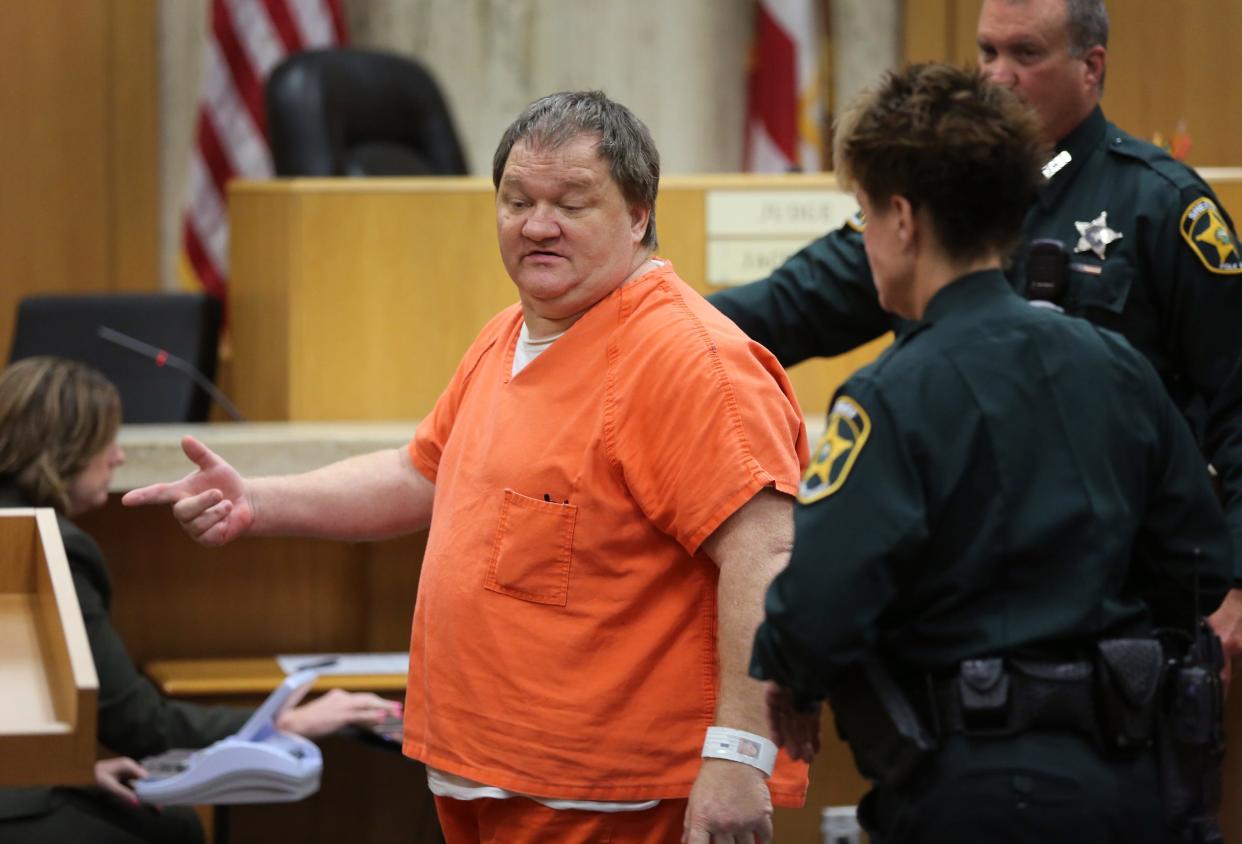 Roy Stephens, left, is escorted out of the courtroom after a hearing in Bartow on March 27, 2015. Stephens is serving a life sentence for his role in the starving death of his 22-day-old baby in 2014. His estranged wife, Ruby, is also serving a life sentence.