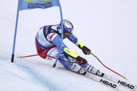 France's Alexis Pinturault speeds down the course during the super G portion of an alpine ski, men's World Championship combined race, in Courchevel, France, Tuesday, Feb. 7, 2023. (AP Photo/Gabriele Facciotti)