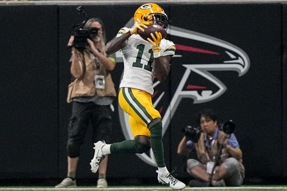 Green Bay Packers wide receiver Jayden Reed (11) makes a touchdown catch against the Atlanta Falcons during the second half of an NFL football game, Sunday, Sept. 17, 2023, in Atlanta. (AP Photo/Brynn Anderson)