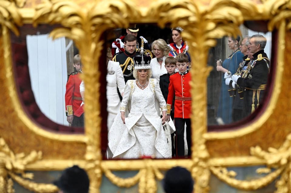 <p>TOPSHOT - Britain's Queen Camilla, wearing a modified version of Queen Mary's Crown leaves Westminster Abbey after the Coronation Ceremonies in central London on May 6, 2023. - The set-piece coronation is the first in Britain in 70 years, and only the second in history to be televised. Charles will be the 40th reigning monarch to be crowned at the central London church since King William I in 1066. Outside the UK, he is also king of 14 other Commonwealth countries, including Australia, Canada and New Zealand. (Photo by TOBY MELVILLE / POOL / AFP) (Photo by TOBY MELVILLE/POOL/AFP via Getty Images)</p> 