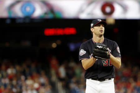 Jun 5, 2018; Washington, DC, USA; Washington Nationals starting pitcher Max Scherzer (31) prepares to pitch against the Tampa Bay Rays in the fifth inning at Nationals Park. Mandatory Credit: Geoff Burke-USA TODAY Sports