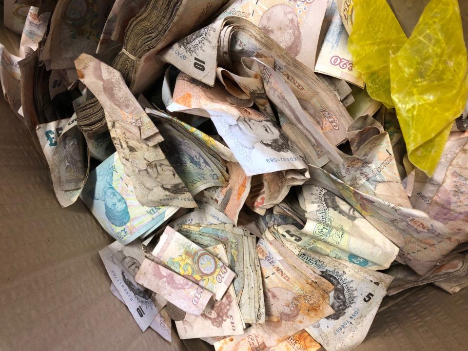Some of the £20,000 in old notes and coins found inside the safe: Sackers