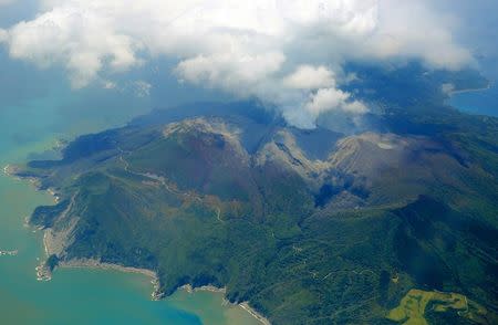 Smoke spews from eruptive crater of Mount Shindake on Kuchinoerabujima island, Kagoshima Prefecture, southwestern Japan, in this aerial view photo taken by Kyodo May 29, 2015. . Mandatory credit REUTERS/Kyodo