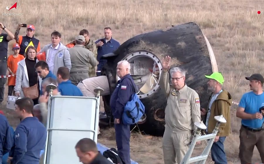 In this photo taken from video released by Roscosmos space corporation, the Russian Soyuz MS-23 space capsule lies on the ground shortly after the landing about 150 km (90 miles) south-east of the Kazakh town of Zhezkazgan, Kazakhstan, Wednesday, Sept. 27, 2023. The Soyuz capsule carrying NASA astronaut Frank Rubio, Roscosmos cosmonauts Sergey Prokopyev, and Dmitri Petelin, touched down on Wednesday on the steppes of Kazakhstan. (Roscosmos space corporation via AP)
