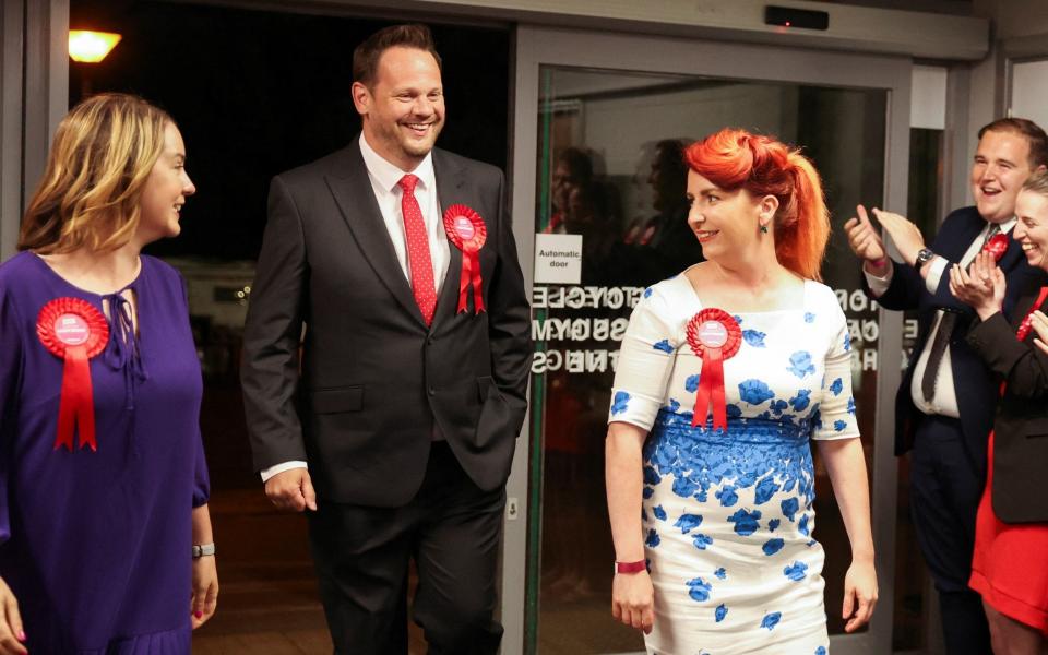 Simon Lightwood arrives at the count with Louise Haigh, right, the shadow transport secretary - REUTERS