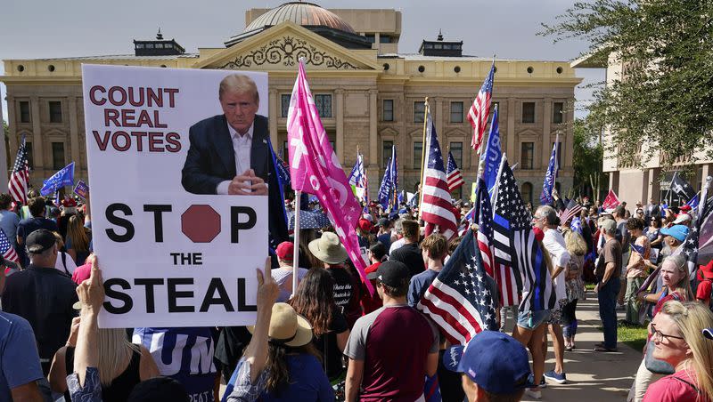 Supporters of President Donald Trump rally outside the Arizona state capitol on Saturday, Nov. 7, 2020, in Phoenix. 