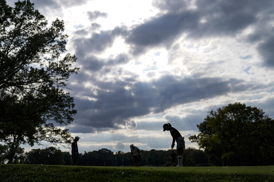 So Yeon Ryu, right, of South Korea, putts on the fourth green in the second round of the Cognizant Founders Cup LPGA golf tournament, Friday, Oct. 8, 2021, in West Caldwell, N.J. (AP Photo/John Minchillo)