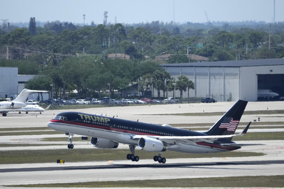 The plane carrying former president Donald Trump lifts off at Palm Beach International Airport, Monday, April 3, 2023, in West Palm Beach, Fla. Trump is heading to New York for his expected booking and arraignment on charges arising from hush money payments during his 2016 campaign.(AP Photo/Rebecca Blackwell)