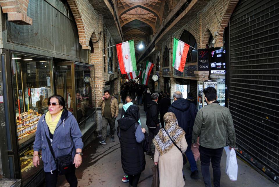 Shoppers in Tehran's Grand Bazaar