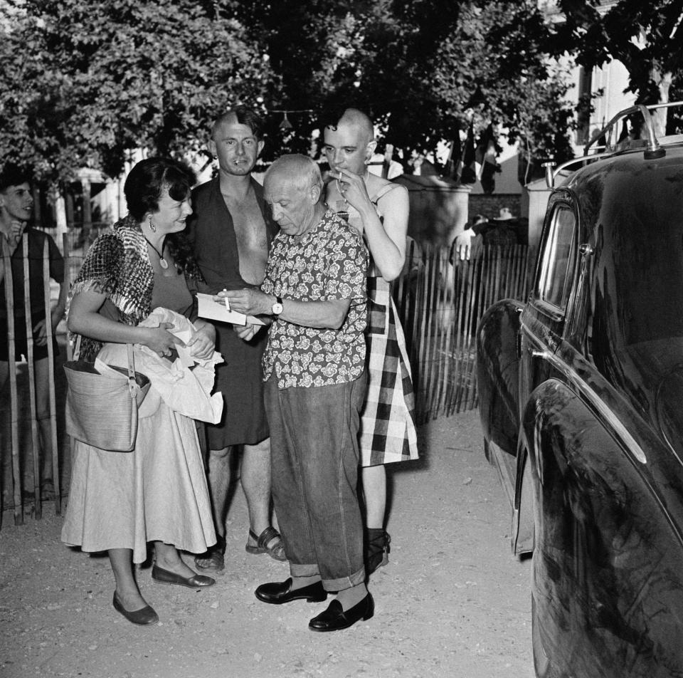 Pablo Picasso, his son Paulo, and Pierre Baudouin, in Vallauris, August 1954.