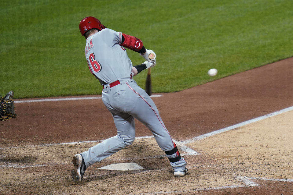 Cincinnati Reds' Colin Moran hits an RBI single against the Pittsburgh Pirates during the eighth inning of a baseball game Thursday, May 12, 2022, in Pittsburgh. (AP Photo/Keith Srakocic)