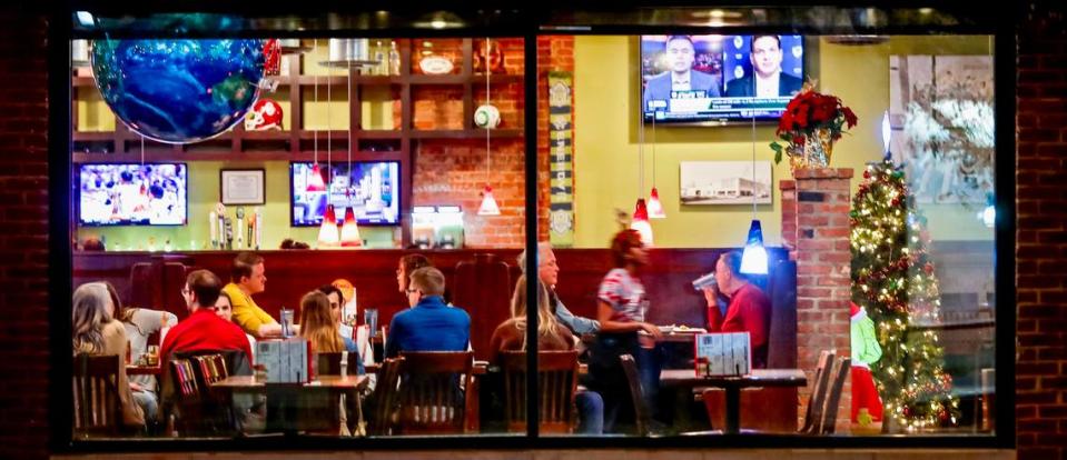 People dine at Hideaway Pizza in Oklahoma City, Wednesday, Nov. 29, 2023.